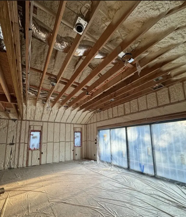 Interior walls and ceiling insulated with spray foam during new construction in Oakdale